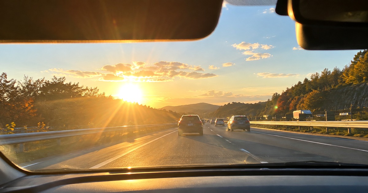 paper driver autumn sun glare driving 20261014